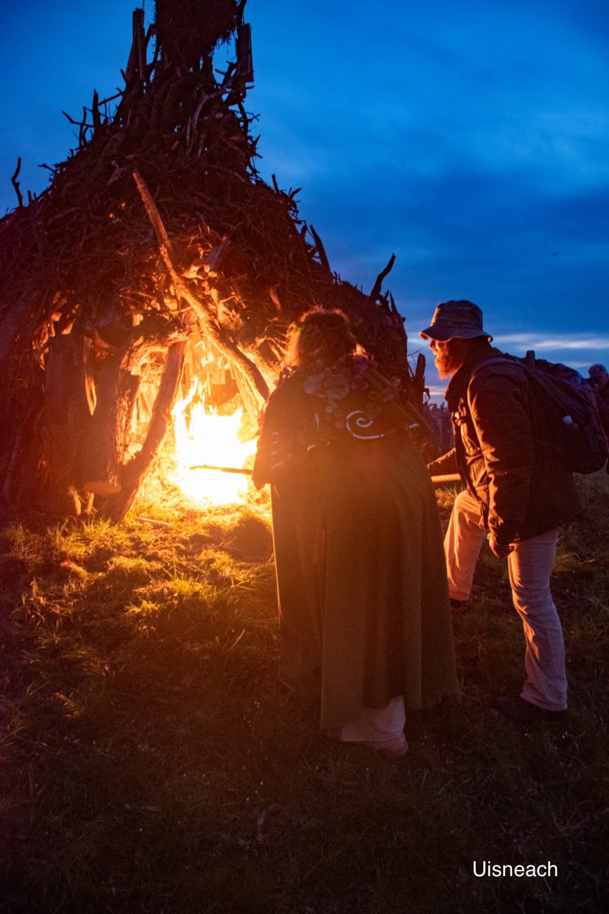 Eriu lighting the great Bealtaine Fire 2022 on the Hill of Uisneach where a great gathering took place celebrating our ancient heritage with lighting a great fire to welcome in the Summer.
