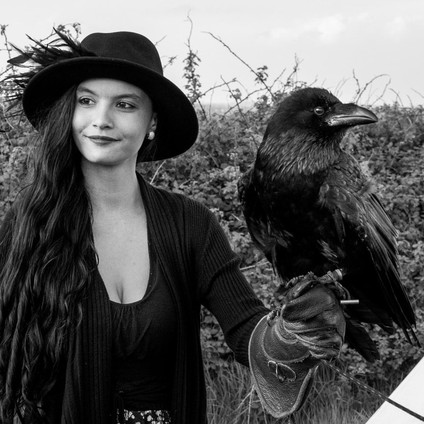 Friend of Uisneach holding a Raven - image in black and white